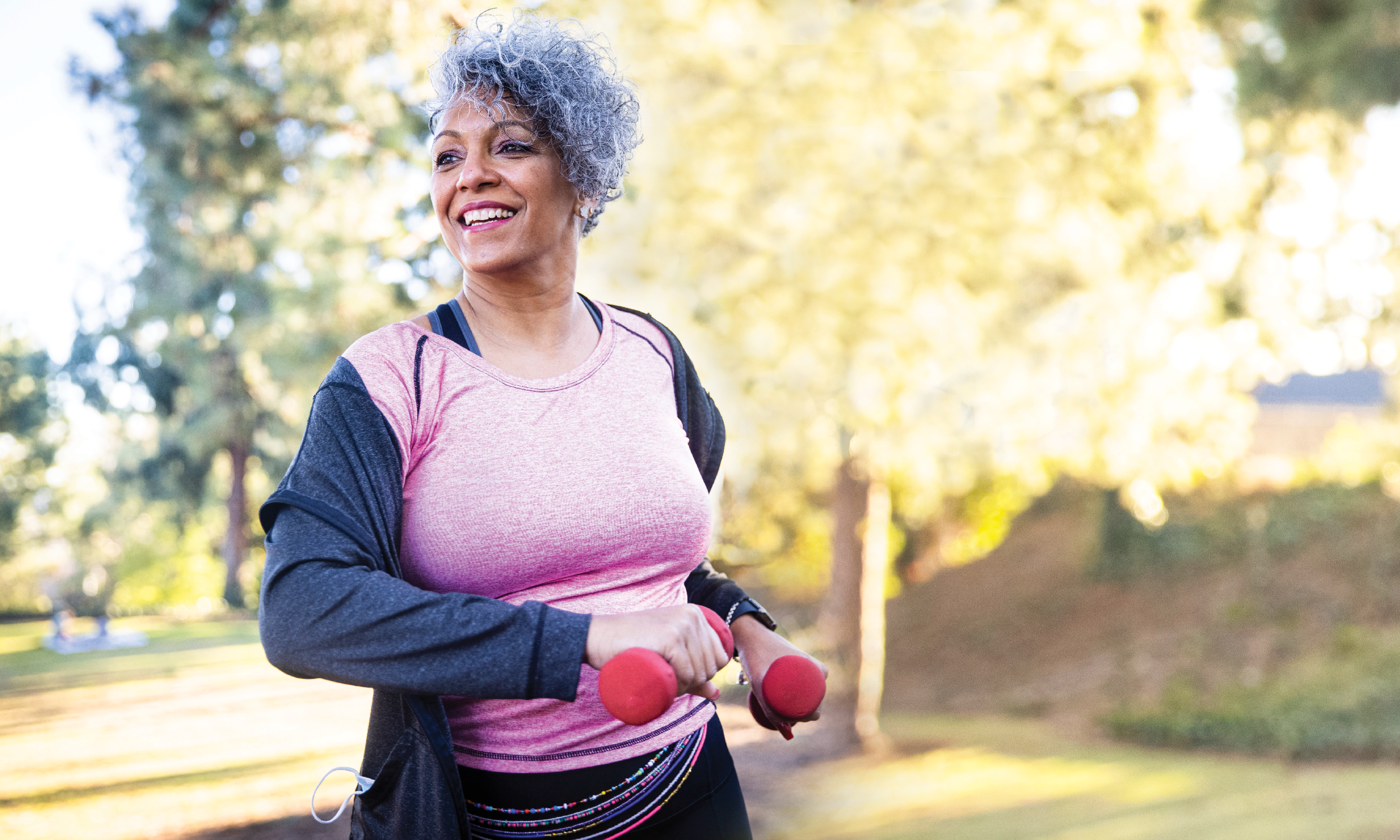 Image of a happy senior practicing easy and safe exercises to help prevent falls.