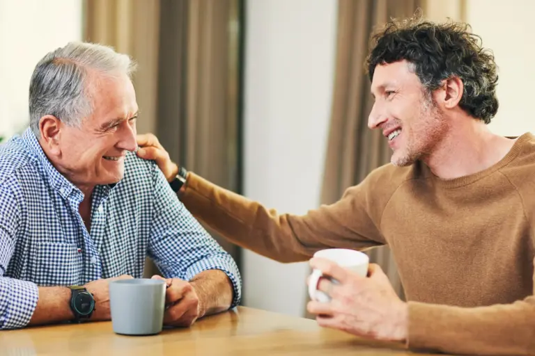 An older gentleman chats with his son about long term care planning.