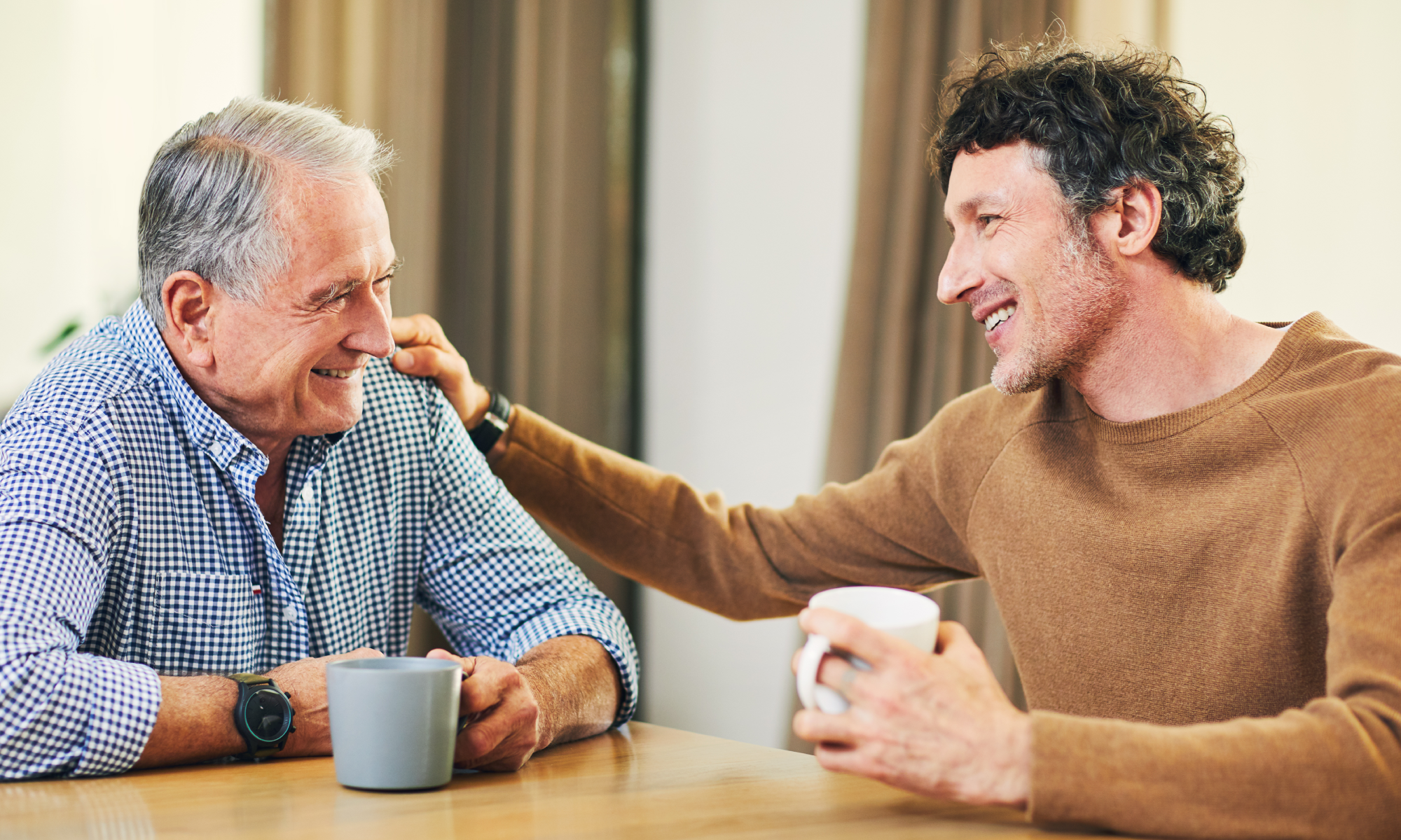 An older gentleman chats with his son about long term care planning.