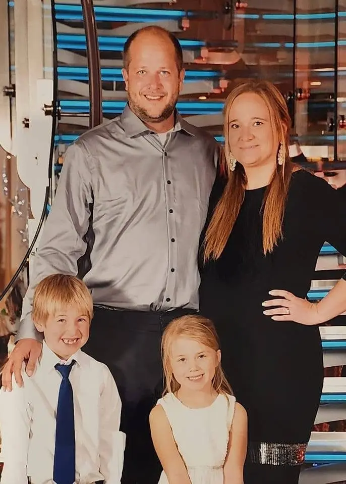 Alan Wikman with his wife Liz and their two children
