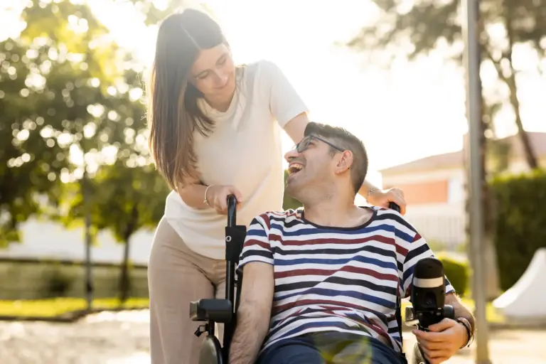 SYNERGY HomeCare caregiver and client outside