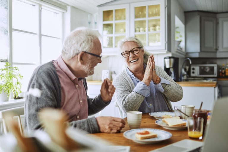 Senior couple having a look at their bills