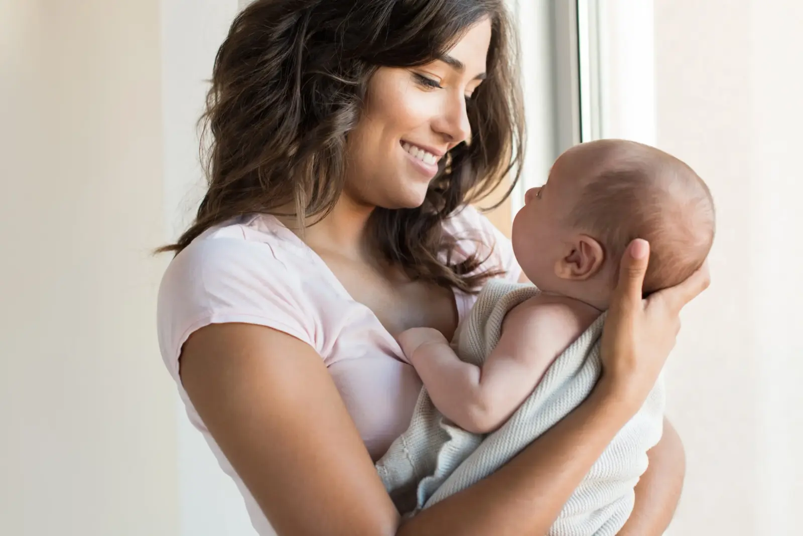 Woman with newborn baby