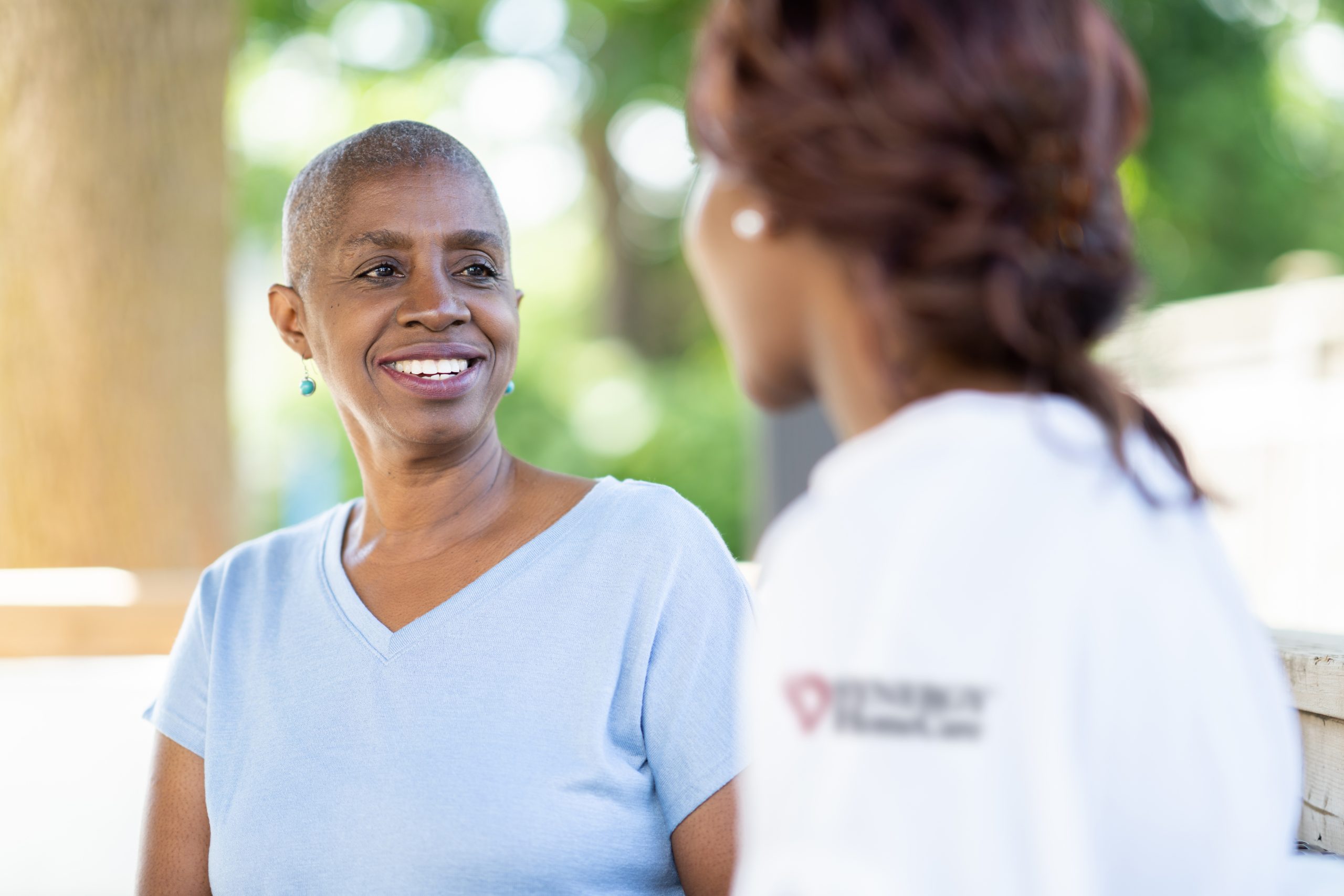 SYNERGY HomeCare caregiver and client talking