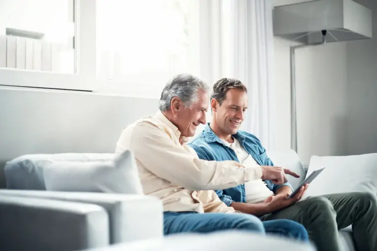 Son and father speaking about the cost of dementia care