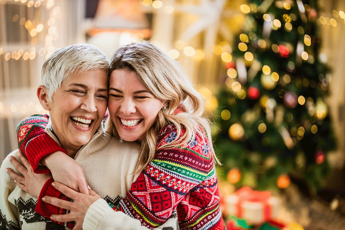 Image of mom and daughter enjoying the holidays and discussing New Year’s resolutions around personal health and home care planning.