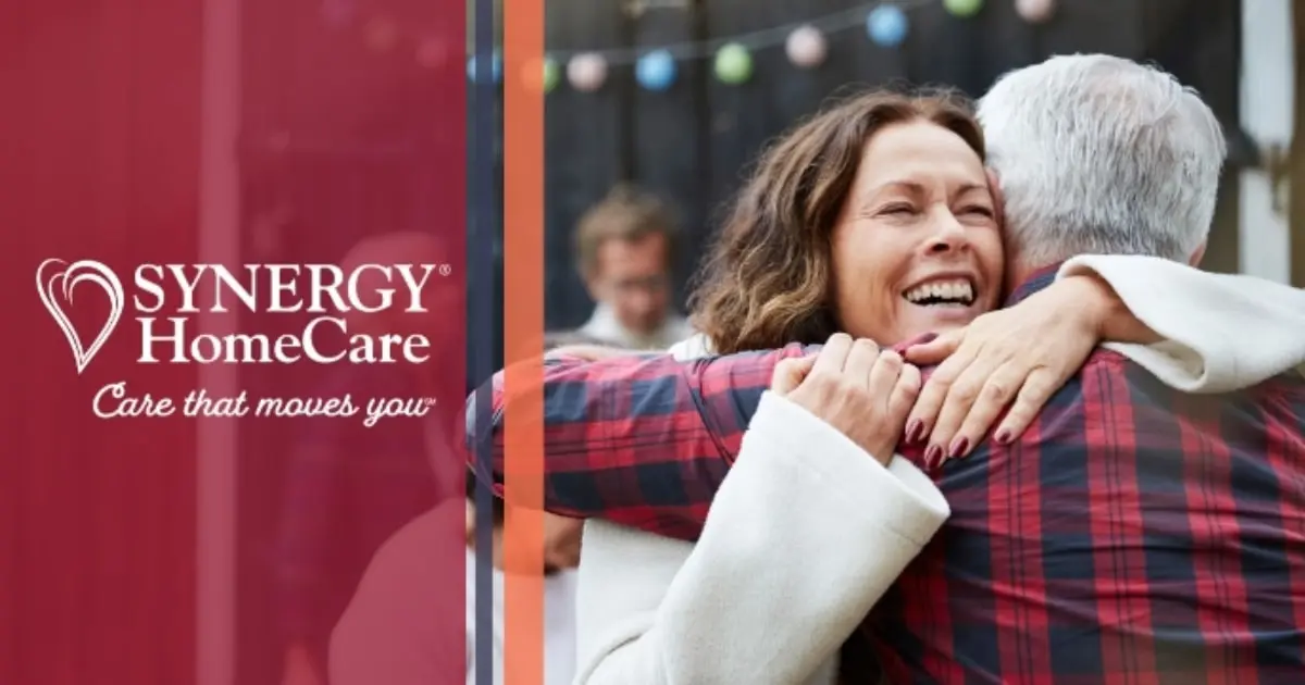 SYNERGY HomeCare client and daughter hugging.