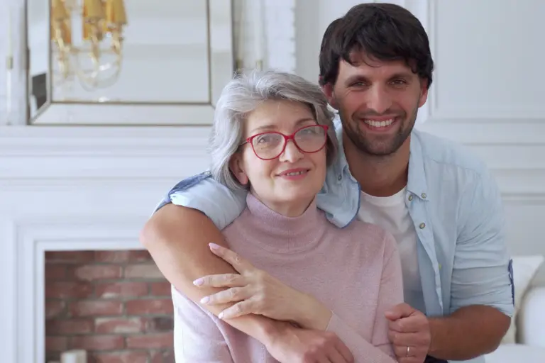 aging mother with loving son