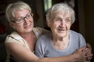 bigstock-an-elderly-woman-with-her-adul-131370128-1.jpg