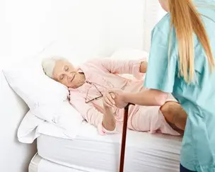 bigstock-caregiver-helping-senior-woman-56442782.jpg