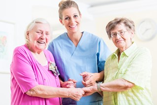 bigstock-elderly-care-nurse-with-two-se-106357208.jpg