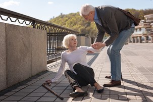 bigstock-elderly-couple-lady-falling-186807634-4.jpg