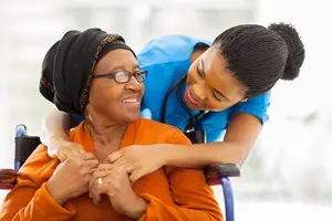 bigstock-happy-senior-patient-with-frie-49942211-1.jpg