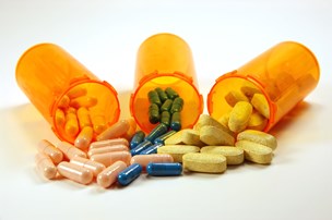 bigstock-medicine-bottles-and-pills-566011-1.jpg