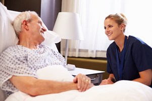 bigstock-nurse-talking-to-senior-male-p-102021836-1.jpg