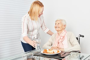 bigstock-nursing-lady-serves-old-woman-247971127-2.jpg