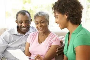 bigstock-senior-couple-talking-to-finan-13907504.jpg