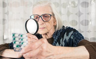 bigstock-senior-woman-reading-pill-name-170465039-1.jpg