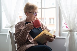 bigstock-senior-woman-relaxing-at-home-354006446-1.jpg