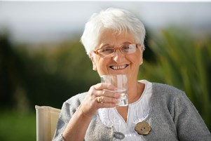 bigstock-senior-woman-with-a-glass-of-w-44770198.jpg