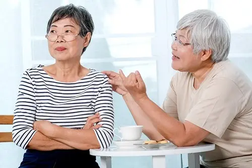 family caregiver with elderly loved one