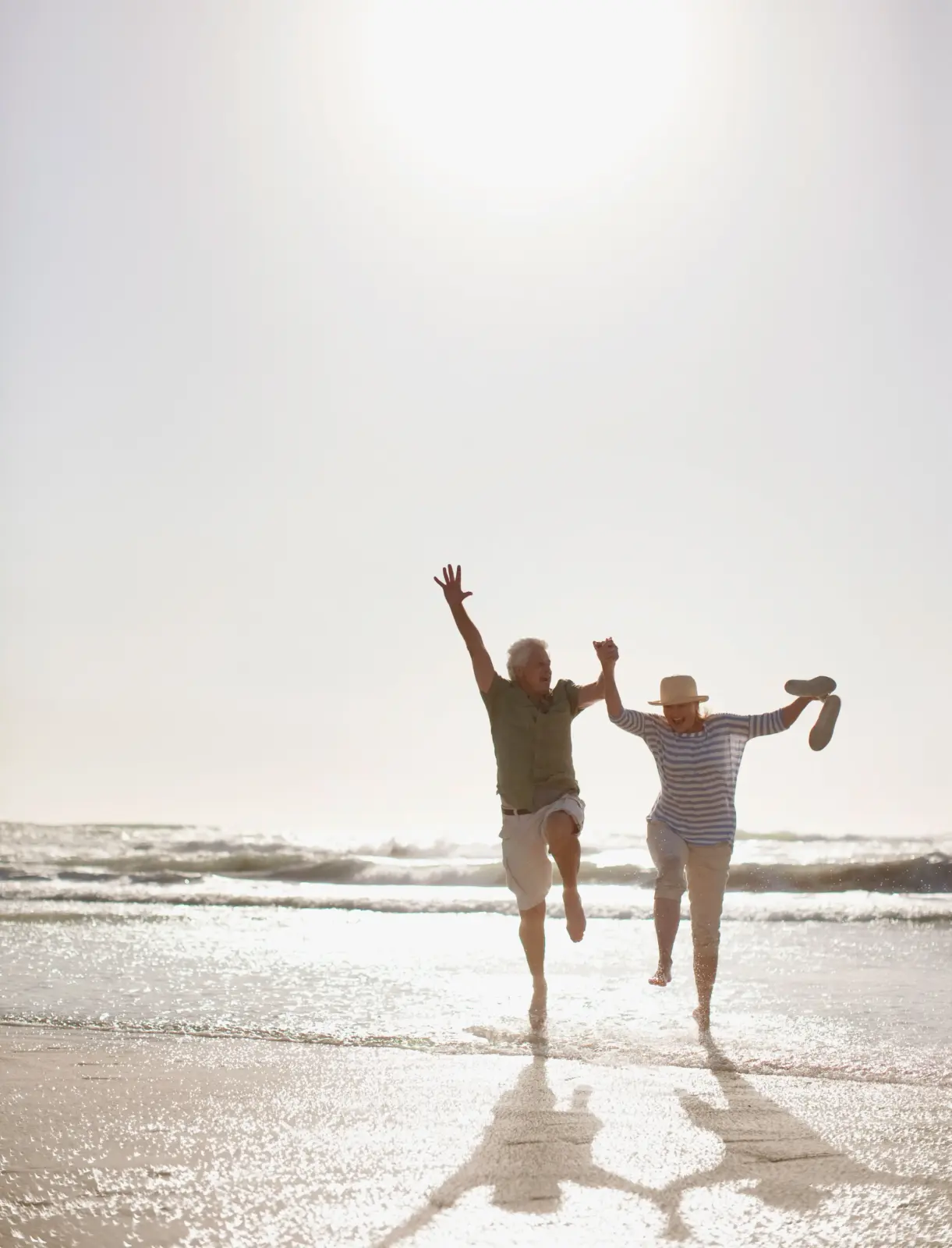 couple-jumping-at-the-beach.jpg