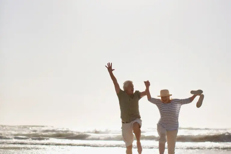 couple-jumping-at-the-beach.jpg
