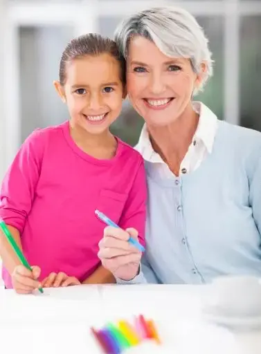 Grandma Coloring With Her Grandkids