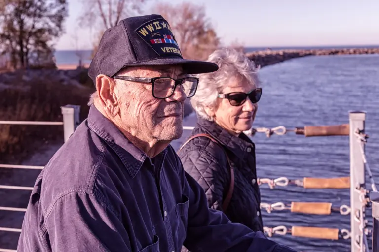 older-couple-sitting-by-water.jpg