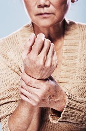 Senior Woman With Painful Arthritis