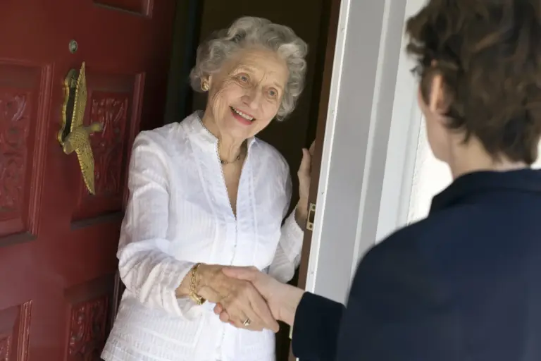 Senior woman friendly handshake
