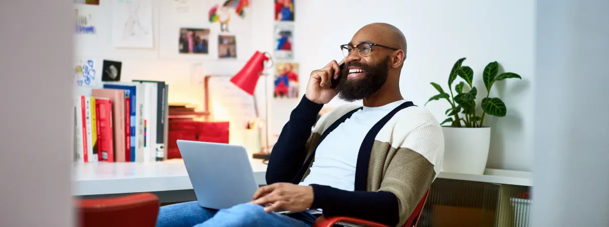 man on the phone while working.