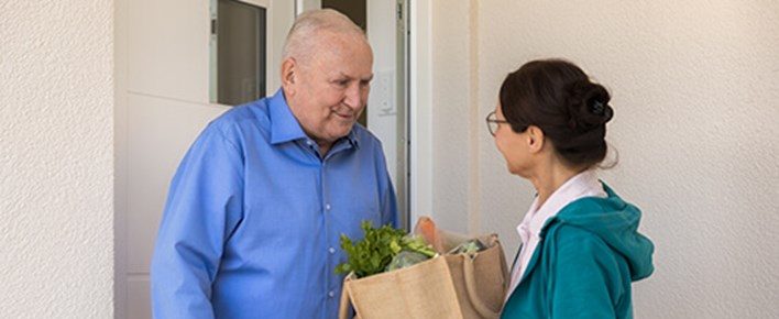 elderly-man-getting-grocery-delivery