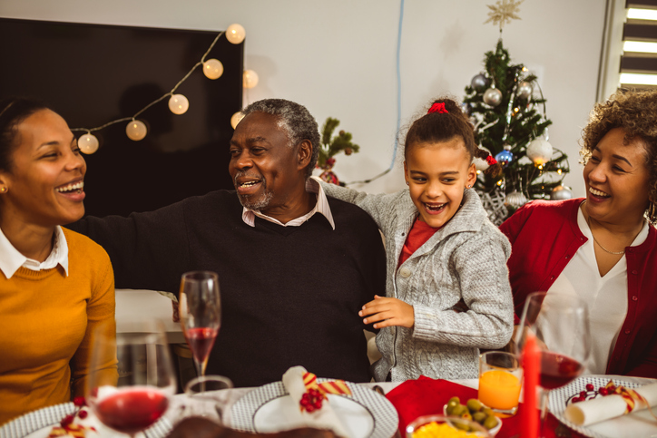 Heartwarming Holiday Gathering Family Celebrates Together Around the Dinner Table