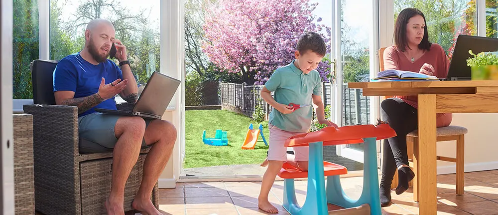 parents-and-kid-working-at-home-sm-2