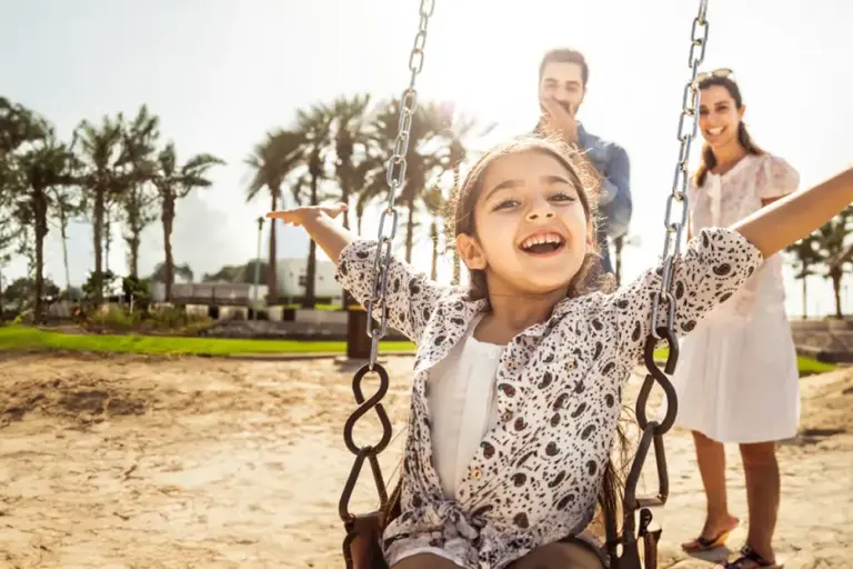 parents at the park with daughter