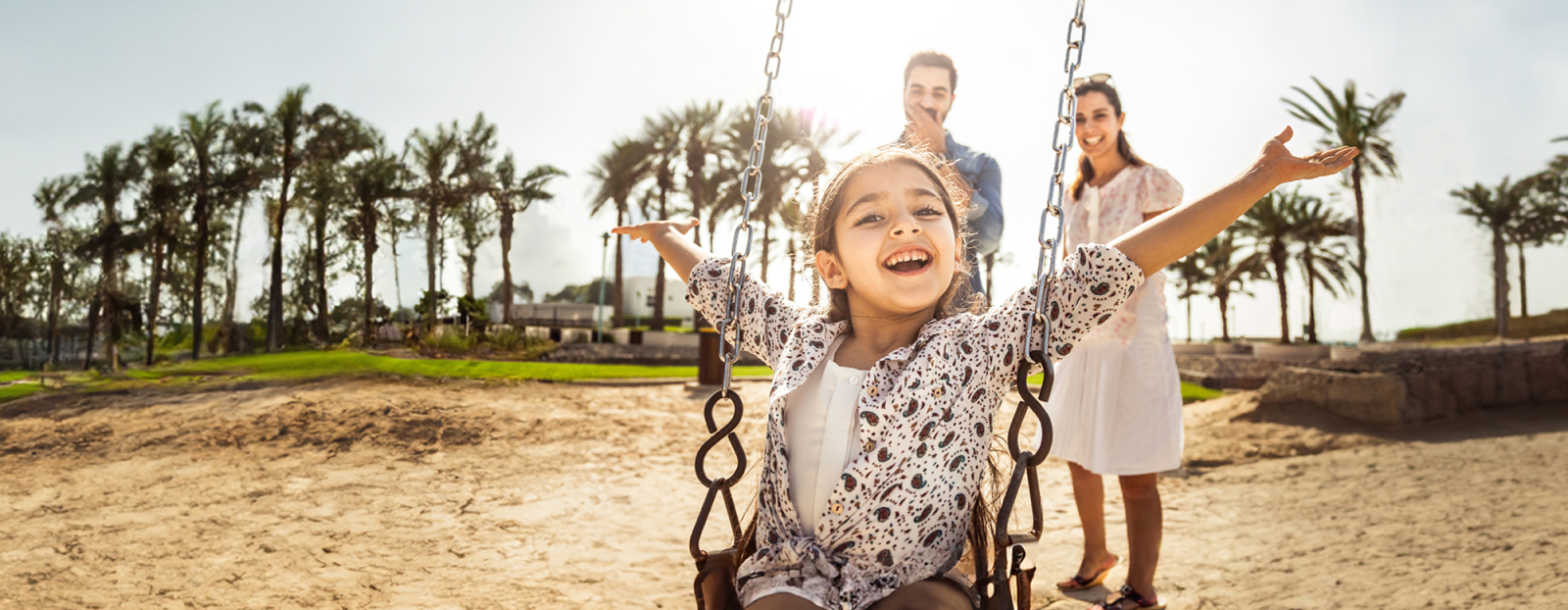 parents at the park with daughter